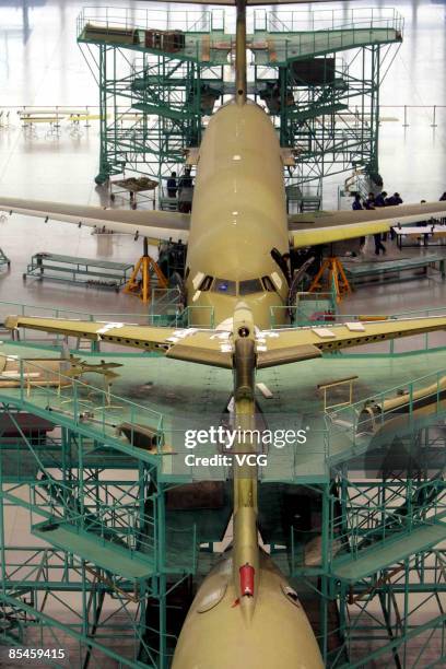 China's first domestically designed and produced passenger jet, the ARJ21, is seen on a production line at a Shanghai Aircraft Manufacturing factory...