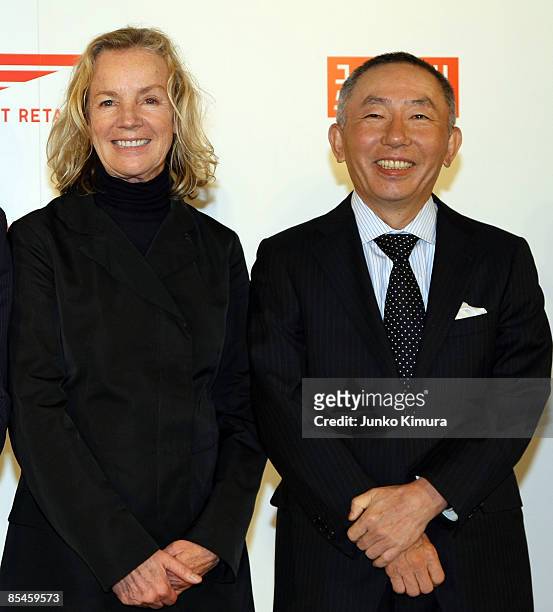Designer Jil Sander and Tadashi Yanai , Chairman and CEO, Fast Retailing Co., Ltd. Pose for photographs during a press conference at Four Seasons...