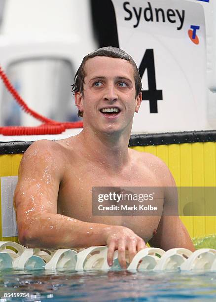 Nick D'Arcy of Queensland Acedemy of Sport celebrates after winning the Men's 200 metres butterfly final during day one of the 2009 Australian...