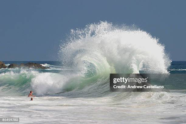 gigantic splash created by colliding ocean waves - laguna beach californië stockfoto's en -beelden