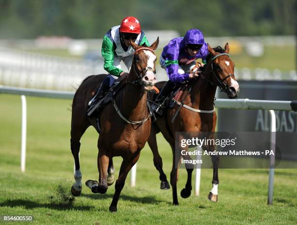 Loving Your Work ridden by jockey William Buick comes home to win the Insure Wiser Handicap ahead of third placed Nyanza ridden by WIlliam...