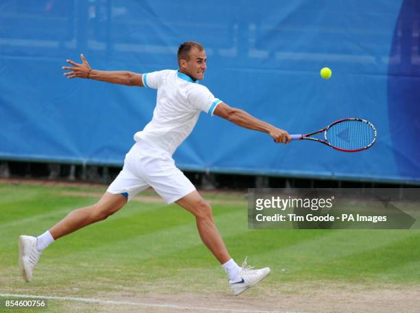 Romania's Marius Copil in action against Great Britain's Marcus Willis during the AEGON Nottingham Challenge at The Nottingham Tennis Centre,...