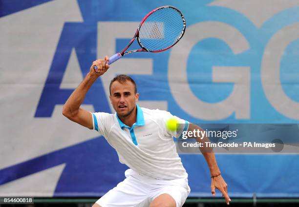 Romania's Marius Copil in action against Great Britain's Marcus Willis during the AEGON Nottingham Challenge at The Nottingham Tennis Centre,...