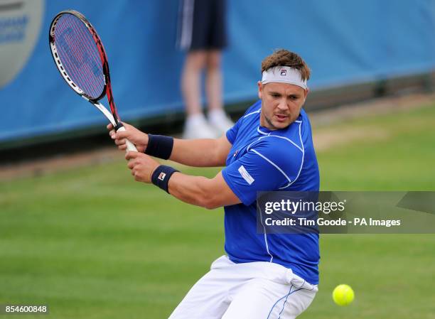 Great Britain's Marcus Willis in action against Romania's Marius Copil during the AEGON Nottingham Challenge at The Nottingham Tennis Centre,...