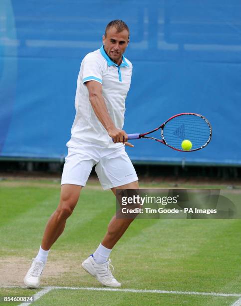 Romania's Marius Copil in action against Great Britain's Marcus Willis during the AEGON Nottingham Challenge at The Nottingham Tennis Centre,...