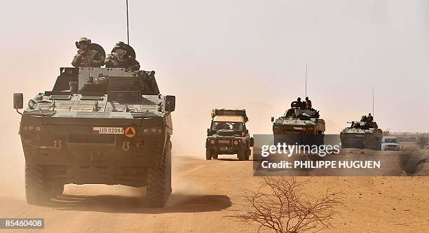Polish soldiers patrol an area outside camp Iriba, north of Chad, on March 12 2009, three days before the European Union's UN-approved mandate...