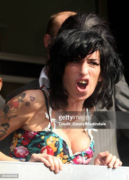 Singer Amy Winehouse arrives at Westminster Magistrates Court to face charges of common assault on March 17, 2009 in London. The soul singer is...