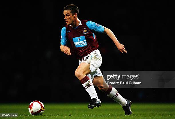 Scott Parker of West Ham runs with the ball during the Barclays Premier League match between West Ham United and West Bromwich Albion at Upton Park...