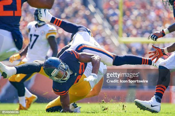 Chicago Bears cornerback Kyle Fuller collides with Pittsburgh Steelers tight end Jesse James to make a tackle during an NFL football game between the...