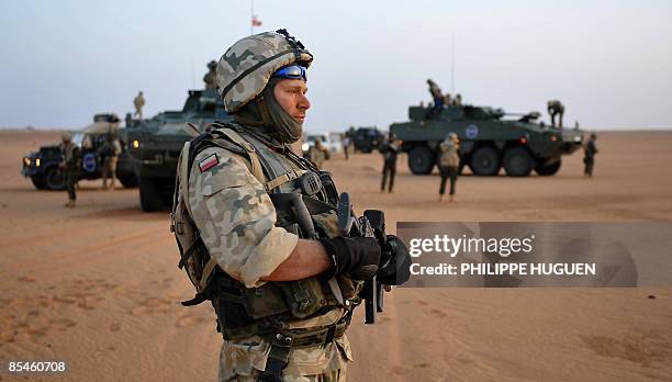 Polish soldier patrols near Iriba in northern Chad on March 12, 2009 as part of the European force force. AFP PHOTO PHILIPPE HUGUEN