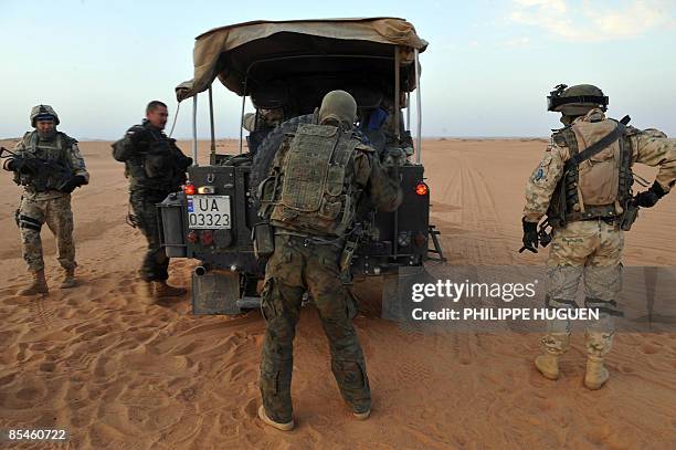 Polish soldier patrols near Iriba in northern Chad on March 12, 2009 as part of the European force force. AFP PHOTO PHILIPPE HUGUEN