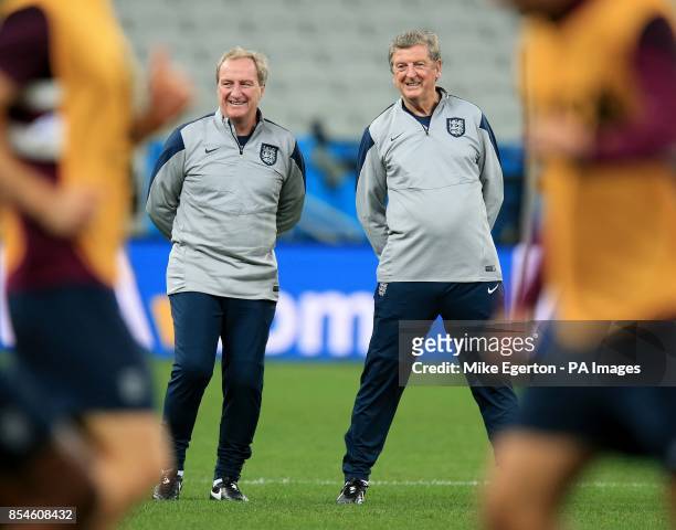 England manager Roy Hodgson with Ray Lewingtonduring a training session at the Estadio do Sao Paulo, Sao Paulo, Brazil.