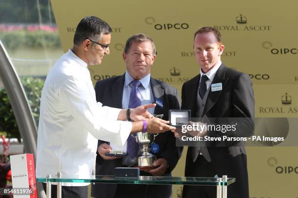 Celebrity chef Atul Kochhar presents the award for the winning trainer of Louis The Pious, David O'Meara after victory in the Buckingham Palace...