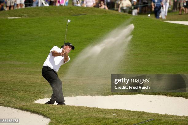 Championship: Phil Mickelson in action from sand, taking third shot out of bunker on No 10 during Saturday play at Blue Monster Course of Doral...