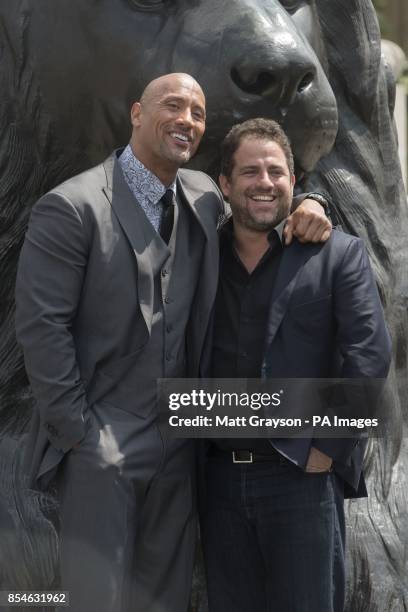 Dwayne Johnson and Director Brett Ratner during a photo call for Paramount Pictures' new film Hercules in Trafalgar Square, London.