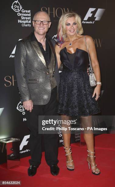 John Caudwell and Claire Johnson arrive at the tenth annual F1 party at the V&A museum in central London in aid of Great Ormond Street Hospital...