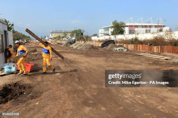 Constructions workers at the Olympic venues for the Rio 2016 Games