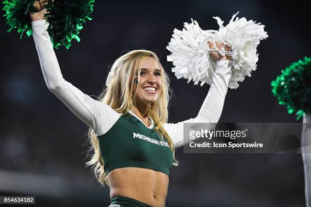 Member of the Spartan Dance Team performs during a non-conference NCAA football game between Michigan State and Notre Dame on September 23 at Spartan...