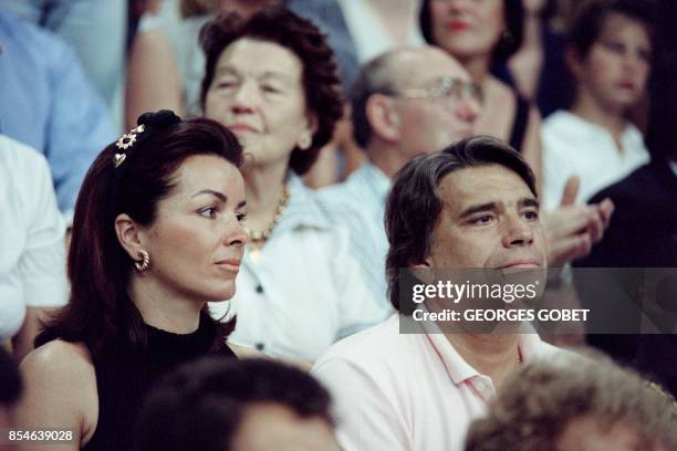 Bernard Tapie and his wife Dominique are pictured on May 30, 1993 in Marseille. Behind them, the parents of Bernard Tapie.