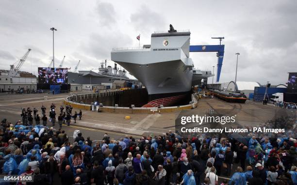 Queen Elizabeth in Rosyth Dockyard, Fife, as the Queen will formally name the Royal Navy's biggest ever ship, with whisky replacing the more...