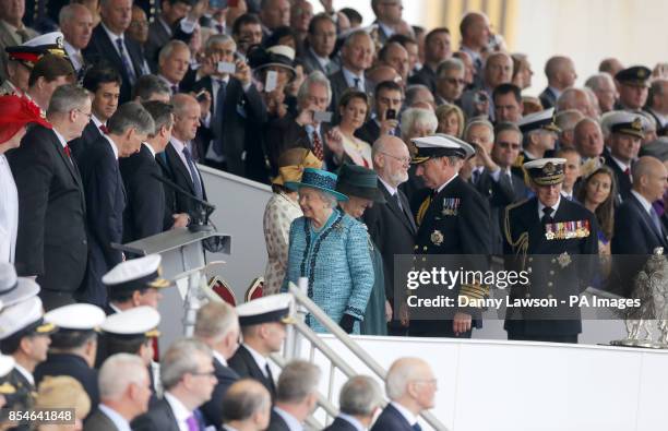 Queen Elizabeth II and the Duke of Edinburgh arrive at HMS Queen Elizabeth in Rosyth Dockyard, Fife, where the Queen will formally name the Royal...