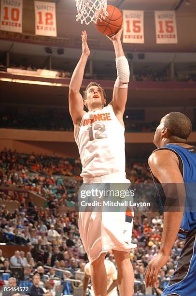 Kristof Ongenaet of the Syracuse Orange takes a shot during a second round Big East Conference Tournament college basketball game against the Seton...