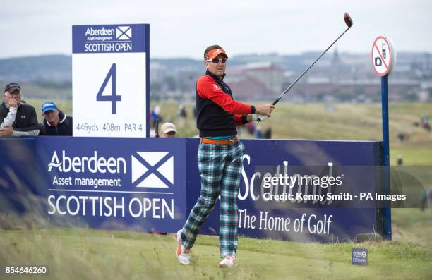 Ian Poulter keeps an eye on his tee shot at the 4th hole during day one of the Aberdeen Asset Management Scottish Open at Royal Aberdeen, Aberdeen.