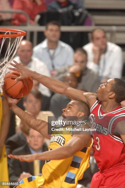 Paris Horne of the St. John's Red Strom blocks a shot during a second round Big East Conference Tournament college basketball game against the...