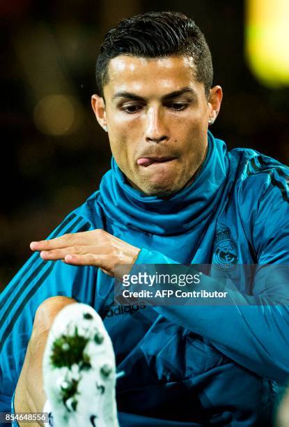 Real Madrid's Portuguese forward Ronaldo warms up prior the UEFA Champions League Group H football match BVB Borussia Dortmund v Real Madrid in...