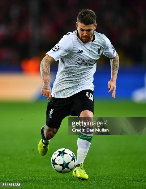 Alberto Moreno of Liverpool takes the ball forward during the UEFA Champions League group E match between Spartak Moskva and Liverpool FC at...
