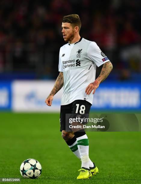 Alberto Moreno of Liverpool takes the ball forward during the UEFA Champions League group E match between Spartak Moskva and Liverpool FC at...