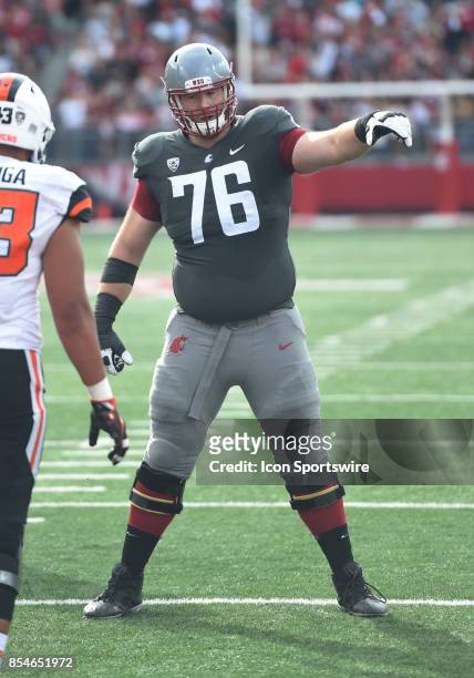 Washington State offensive lineman Cody O'Connell points out a blocking assignment during the game between the Oregon State Beavers and the...