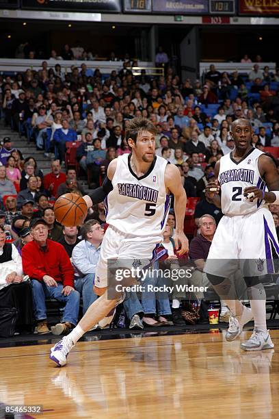 Andres Nocioni of the Sacramento Kings moves the ball up court during the game against the Denver Nuggets at Arco Arena on March 8, 2009 in...