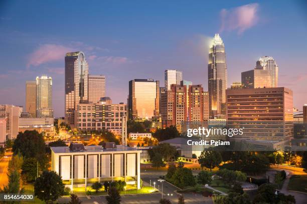 city skyline of charlotte north carolina usa - charlotte north carolina skyline stock pictures, royalty-free photos & images