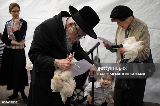 Kaparot Ritual Kaparot Ceremony Performed In Israel Photos and Premium High Res ...