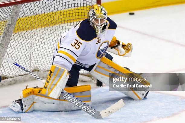 Goaltender Anders Lindback of the Buffalo Sabres warms up before the game against the New York Islanders at Barclays Center on April 4, 2015 in...