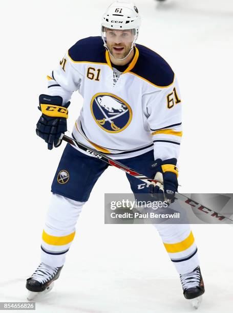 Andre Benoit of the Buffalo Sabres plays in the game against the New York Islanders at Barclays Center on April 4, 2015 in Brooklyn borough of New...