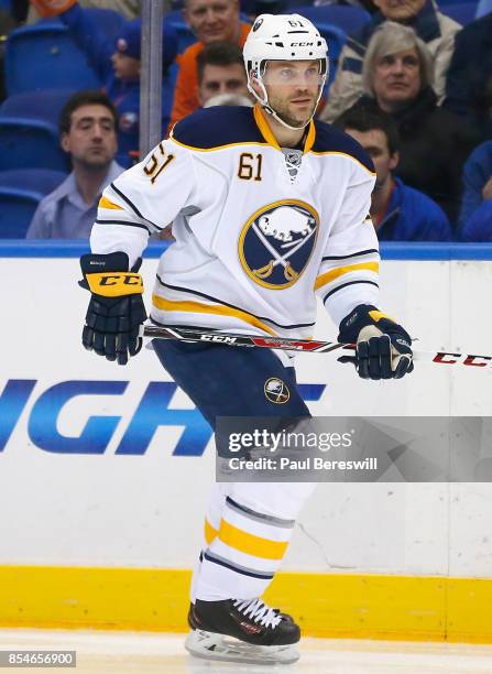 Andre Benoit of the Buffalo Sabres plays in the game against the New York Islanders at Barclays Center on April 4, 2015 in Brooklyn borough of New...