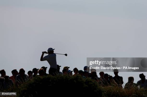 Australia's Adam Scott tees off on the 12th hole during day one of the 2014 Open Championship at Royal Liverpool Golf Club, Hoylake.