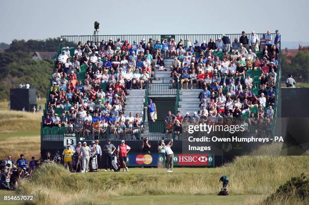 Australia's Adam Scott tees off on the 13th hole during day one of the 2014 Open Championship at Royal Liverpool Golf Club, Hoylake.