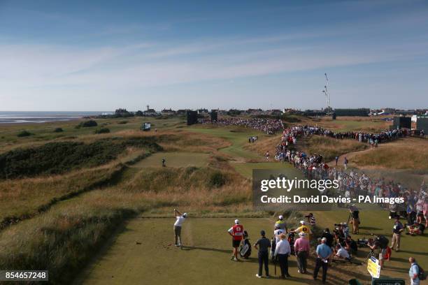 Australia's Adam Scott tees off on the 13th hole during day one of the 2014 Open Championship at Royal Liverpool Golf Club, Hoylake.