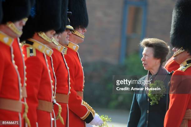 Princess Anne, The Princess Royal presents shamrock to guards during a visit to see the 1st Battalion Irish Guards doing a St Patrick's Day Parade at...