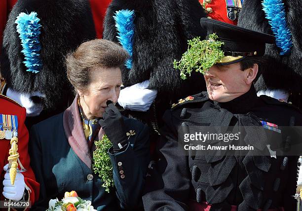 Princess Anne, The Princess Royal poses with guards during a visit to see the 1st Battalion Irish Guards doing a St Patrick's Day Parade at their new...