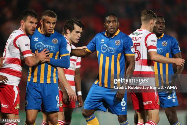 Shrewsbury Town players and Doncaster Rovers players during the Sky Bet League One match between Doncaster Rovers and Shrewsbury Town at Keepmoat...