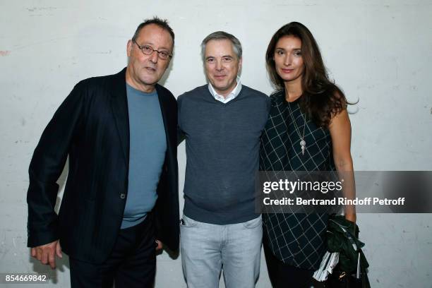 Stylist Olivier Lapidus standing between Jean Reno and his wife Zofia Reno pose Backstage after the Lanvin show as part of the Paris Fashion Week...