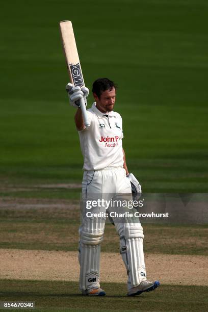 Chris Read of Nottinghamshire celebrates his century during day three of the Specsavers County Championship Division Two match between Sussex and...