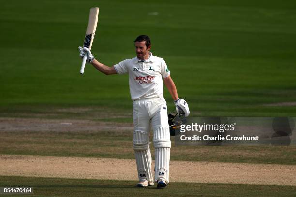 Chris Read of Nottinghamshire celebrates his century during day three of the Specsavers County Championship Division Two match between Sussex and...