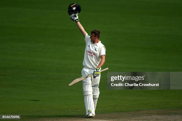Billy Root of Nottinghamshire celebrates his century during day three of the Specsavers County Championship Division Two match between Sussex and...