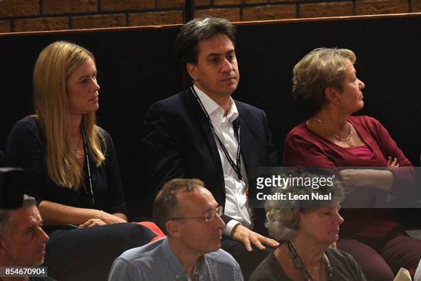 Former Labour Ed Miliband listens TO Leader Labour Leader Jeremy Corbyn addressING delegates on the final day of the Labour Party conference on...