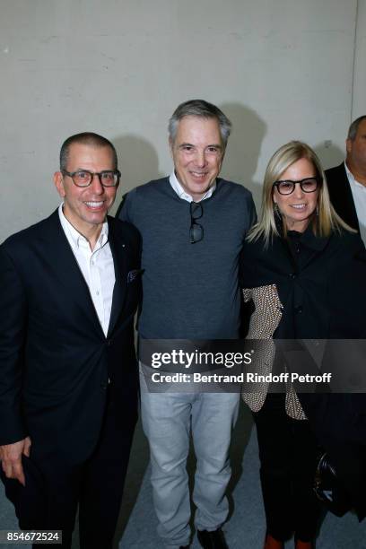 Stylist Olivier Lapidus standing between Jonathan Newhouse and his wife Ronnie Cook Newhouse pose Backstage after the Lanvin show as part of the...